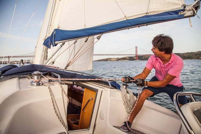 2,5h Lisbon Sunset Sail with Drinks and Snacks - Steering the Boat: what hands-on sailing really means