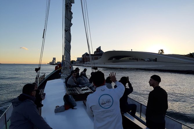 2-Hour Lisbon Traditional Boats Sunset Cruise with White Wine - Belém from the water: Tower, Jerónimos, and the Discoveries monument