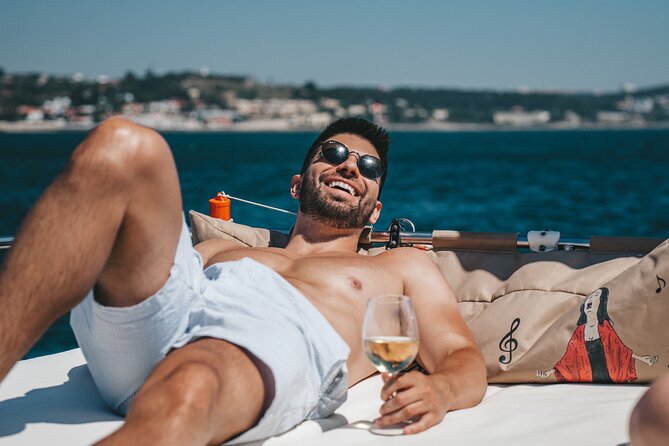 4 Hours Private Tour with Dives in Catamaran in Lisbon - Stop 1: Doca de Belém docks, a security briefing, and wine on deck