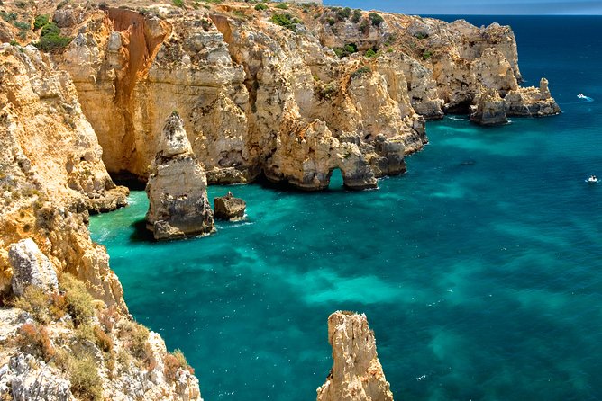 ALGARVE FROM THE SEA PORTIMÃO includes boat trip to Benagil caves AND LAGOS - Praia da Rocha and Ponta da Piedade: cliffs, fortress views, and light