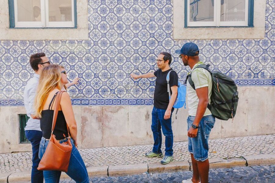 Best of Lisbon Walking Tour: Rossio, Chiado & Alfama - Alfama: Fado Mood, Wine Tasting, and the Tile-Facade Detail