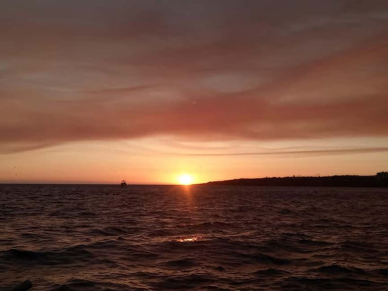 Cascais: Sunset Boat Trip with Welcome Drinks - Cascais from the water: mansions, fortifications, and 007-style coastal landmarks