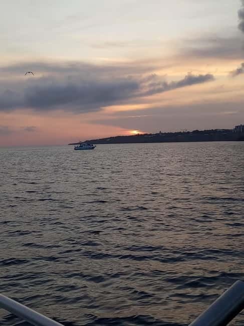 Cascais: Sunset Boat Trip with Welcome Drinks - The Costa da Guia angle: cruising toward the sun-meets-sea moment