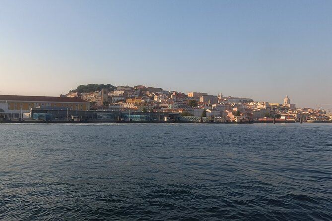 Cascais to Lisbon Sunset Cruise With Open Bar - Belém Tower, Discoveries Monument, and the 25th of April Bridge