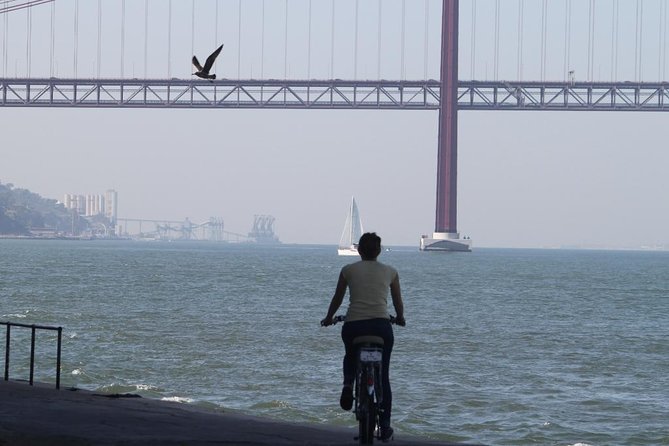 Christ the King - Lisbon - 3 Hour Electric Bike Tour - Santuario Nacional de Cristo Rei: Seeing It From Under the Arms