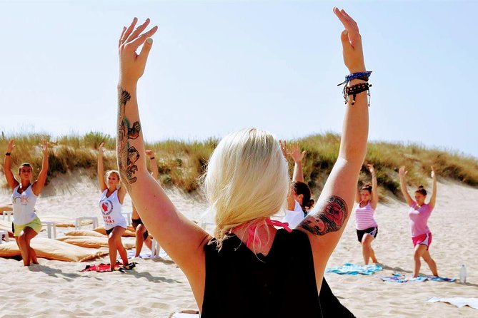 Costa da Caparica Surf and Yoga from Lisbon - Yoga on the beach: relaxed, practical, and actually useful
