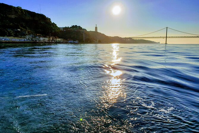 Daytime/Lisbon Sunset Boat with history and wine (small group) - History From the Water: Stories That Make the City Legible