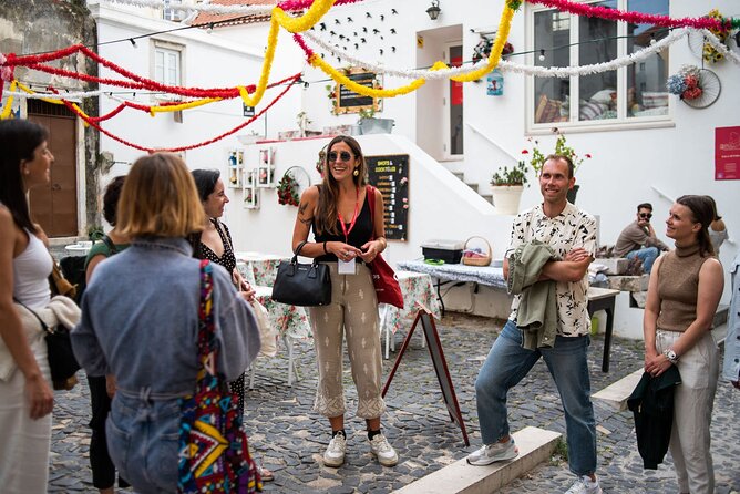 Devour Lisbon Food & Fado Tour Mouraria & Alfama Neighbourhoods - Petiscos stop in an atelier-turned restaurant: croquettes, beer, and local rhythm