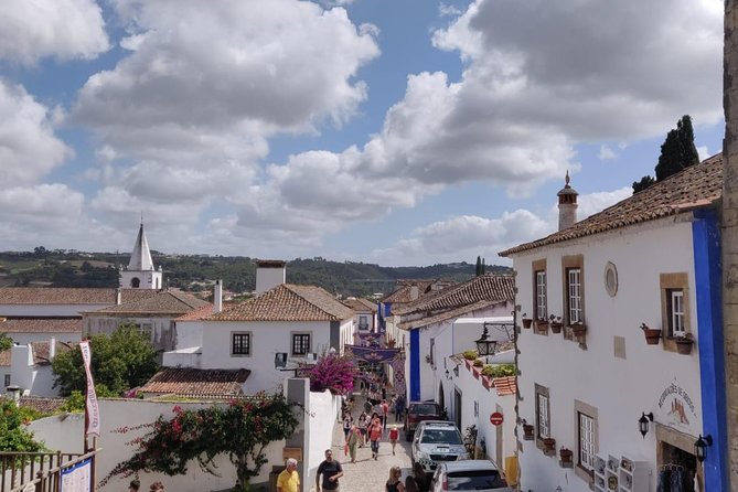 Discover Fátima, Batalha, Nazaré and Óbidos by VAN -Full Day Tour - Nazaré: a quiet coastal break plus crafts to browse (and lunch on your terms)