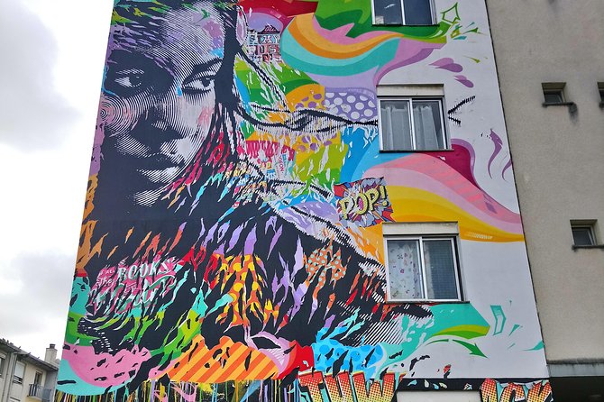 Discover Lisbon's Best Street Art - The Lisbon hotspot wall: Eduardo Kobra and scale you feel