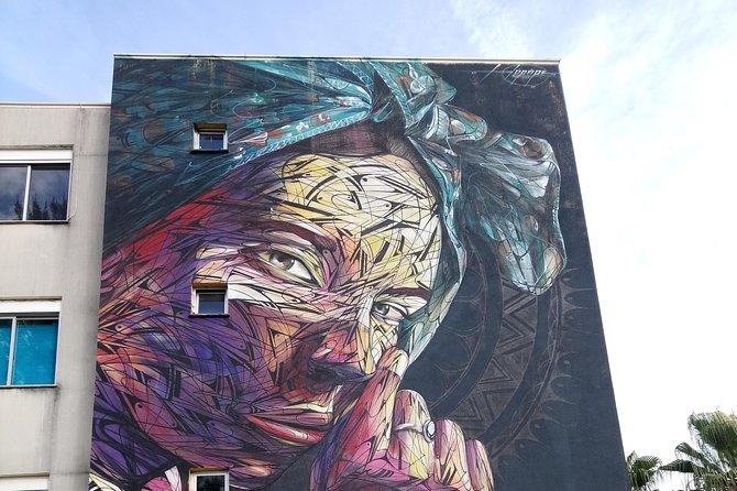 Discover Lisbon's Best Street Art - Secret galleries and neighborhood street-art energy (Chão do Loureiro, Marvila, Padre Cruz)
