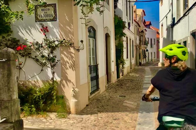 E-bike from Sintra Mountains to Cascais Sea with pickup in Lisbon - Guincho Beach: a real coastal pause before Boca do Inferno