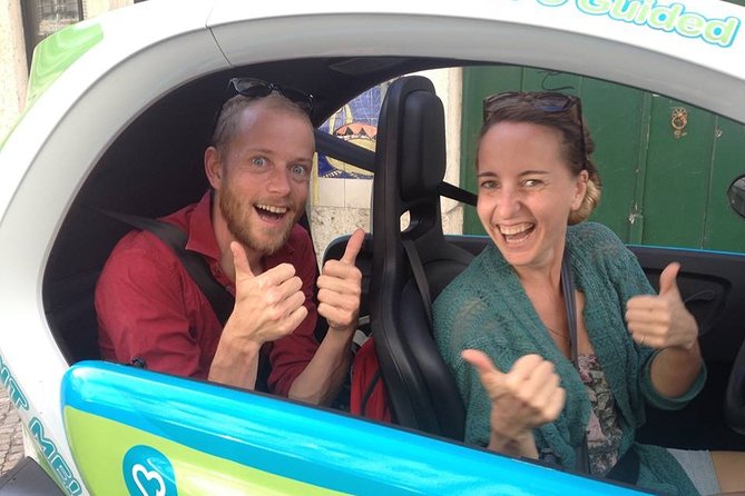 Electric Car Tour of Lisbon Old Town and Belém with GPS Audio Guide - Alfama experience: old streets, colorful quiet, and real neighborhood feel