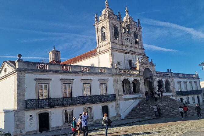 Excursion in Nazaré Fátima and Óbidos Village and Batalha Monastery - Stop 5: Óbidos village walls, aqueduct vibes, and ginjinha planning