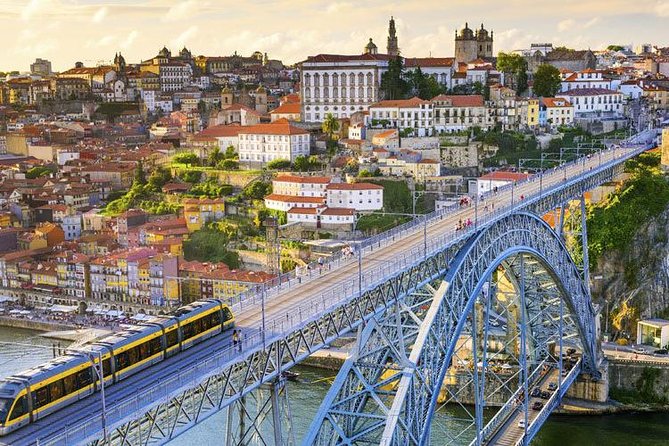 Explore Porto & Aveiro within Riverboat Cruises - Private Full Day Tour from Lisbon with Lunch - Porto’s UNESCO center: Clerigos, São Bento, Cathedral, and Ribeira