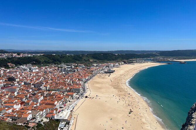 Fátima, Aljustrel, Nazaré and Óbidos Full Day Tour from Lisbon - Óbidos Village: UNESCO Streets, Castle Vibes, and Ginjinha in Chocolate Cups