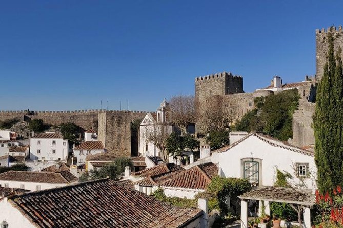 Fátima Batalha Nazaré and Óbidos Full Day Tour from Lisbon - Nazaré beach time: seafood lunch breaks and wave views