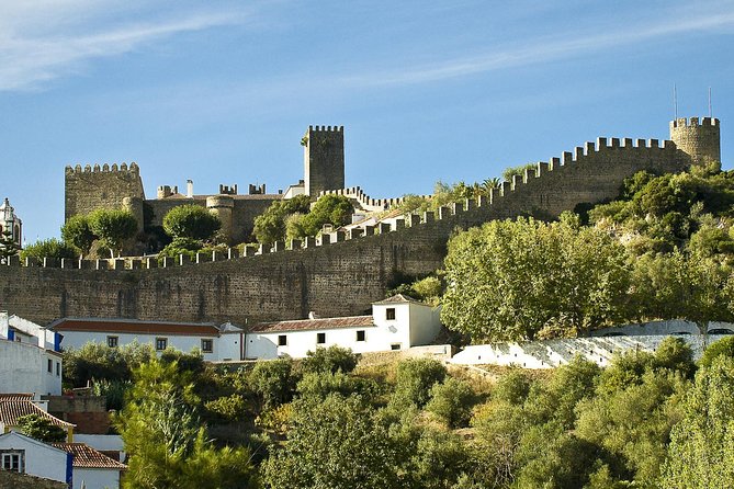 Fátima, Batalha, Nazaré and Óbidos Private Tour - Óbidos Medieval Walls and Ginjinha in a Chocolate Cup