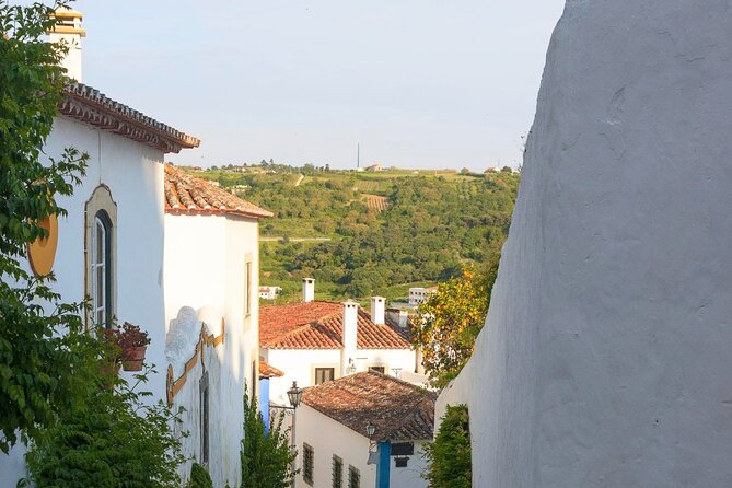 Fatima, Batalha, Nazaré & Óbidos Private Luxury Tour - Óbidos medieval streets and the ginjinha you’ll want to try