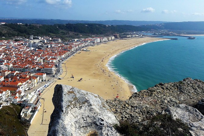 Fatima Sanctuary & Obidos Ancient Village Private Luxury Tour - Nazare fishing village: oldest-village feel with big-wave fame