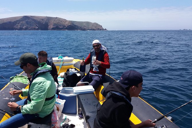Fishing Boat Rental - Getting Help With Fish, Unhooking, and Cooking Later