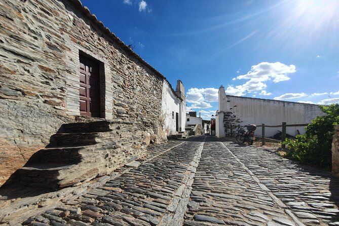 From Lisboa: Évora & Monsaraz Small-Group Full Day Tour - A smooth start from Lisbon to the 25th April Bridge