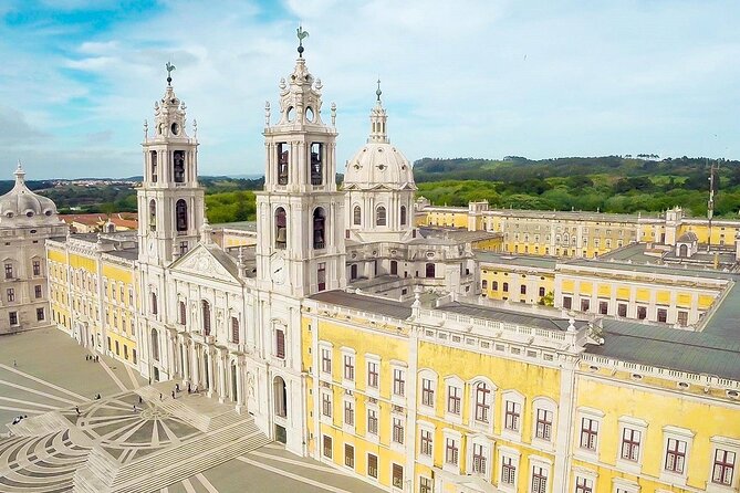 From Lisboa: Mafra, Ericeira & Queluz Small-Group Full Day Tour - Mafra National Palace: the 1735 complex and the library you’ll remember
