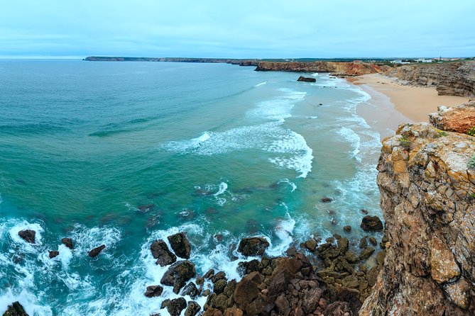 From Lisbon: Algarve Private Tour to Portimao, Lagos and Sagres - Praia da Rocha and its fortress views: postcard sand plus defense history