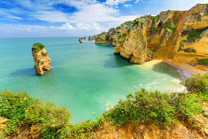 From Lisbon: Algarve Private Tour to Portimao, Lagos and Sagres - Praia da Marinha: the Algarve beach used by big-name ads