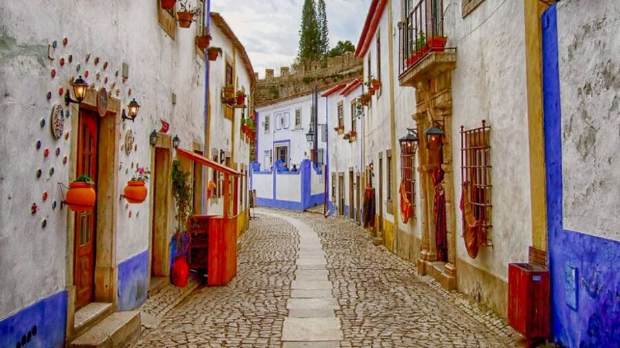 From Lisbon: Fátima, Batalha, Nazaré & Óbidos Full-Day Tour - A Full-Day Route From Lisbon: Faith, Gothic Stone, Surf Legends, and Walls