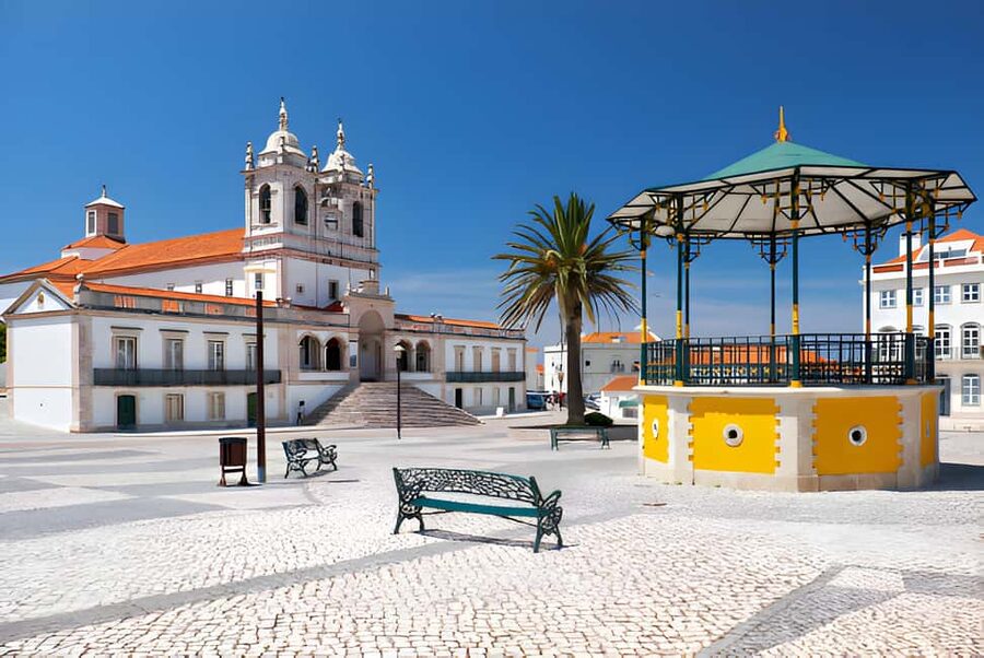 From Lisbon: Fatima, Nazaré, and Obidos Small Group Tour - Óbidos: medieval lanes, town walls, and ginjinha