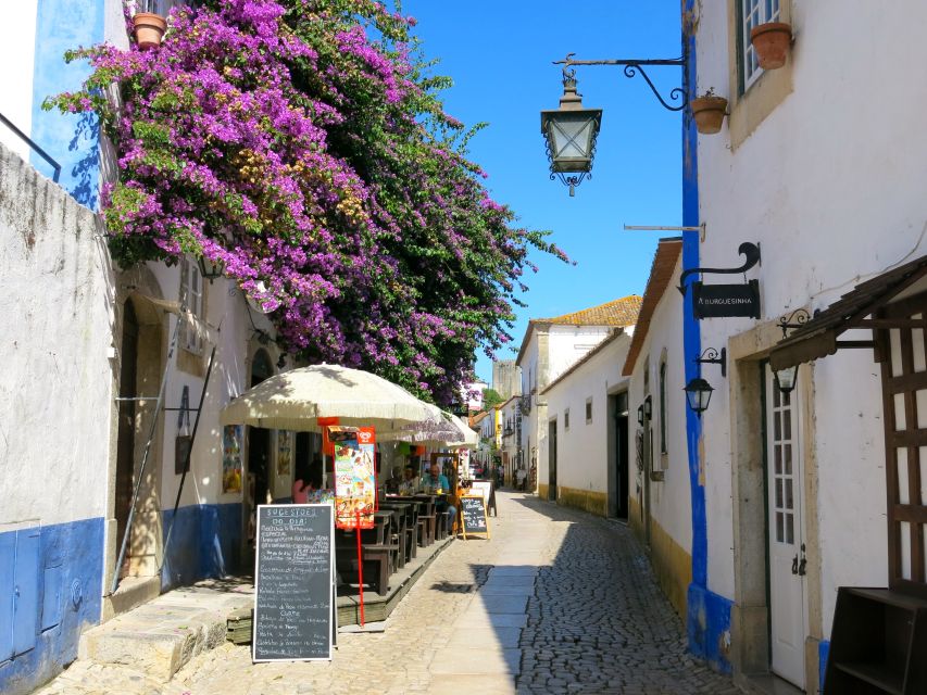 From Lisbon: Fátima Sanctuary, Nazaré & Óbidos - Nazaré cliffs, Atlantic views, and the surfing legend angle