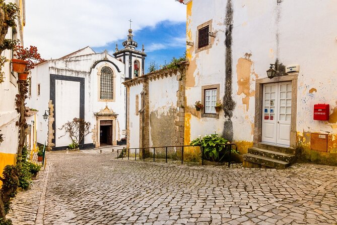 From Lisbon : Óbidos & Nazaré Giant Waves, Ginja & Small Group - Nazaré coastal time: tradition, beaches, and the waves question