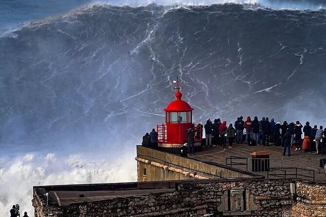 From Lisbon : Óbidos & Nazaré Giant Waves, Ginja & Small Group - Farol de Nazaré: Fort São Miguel Arcanjo and that red lighthouse look