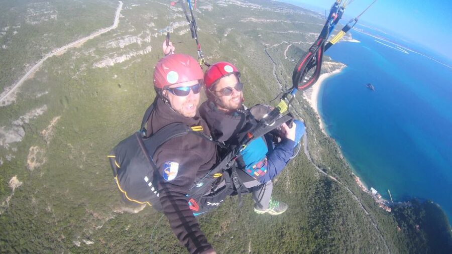 From Lisbon: Paragliding Flight with Transfers - 20 Minutes of Engine-Free Flying Over Praia das Bicas to Sesimbra