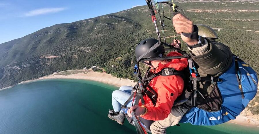 From Lisbon: Paragliding Pack (Flight+Video+Transportation) - The Flight Itself: 20 Minutes Over Fonte da Telha, Bicas Beach, and Arrábida