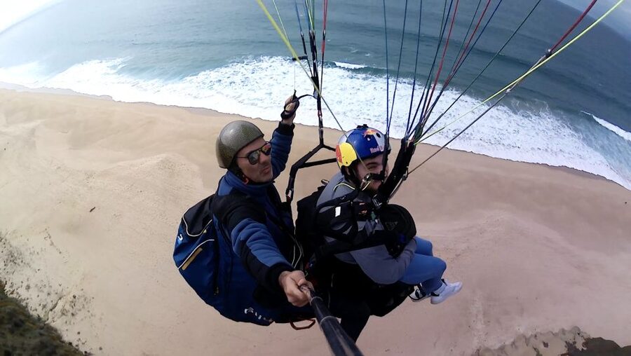 From Lisbon: Paragliding Tandem Flight - The View: Ocean Color, Coastline Lines, and the “Bird” Effect