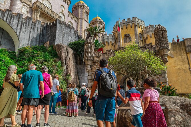 From Lisbon: Small Group to Pena Palace, Nazaré & Fátima - Pena Palace and Sintra hills: fairy-tale exteriors with real walking