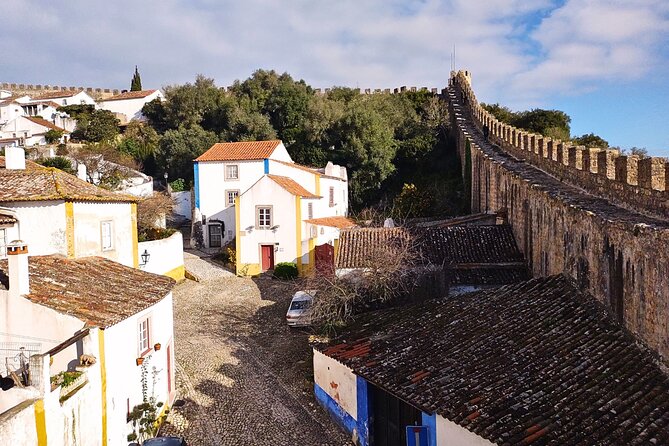 From Lisbon : Tour Óbidos & Nazaré - Medieval Villa and Giant Waves - Praia da Nazaré: The North Beach View That Makes People Plan Winter Trips