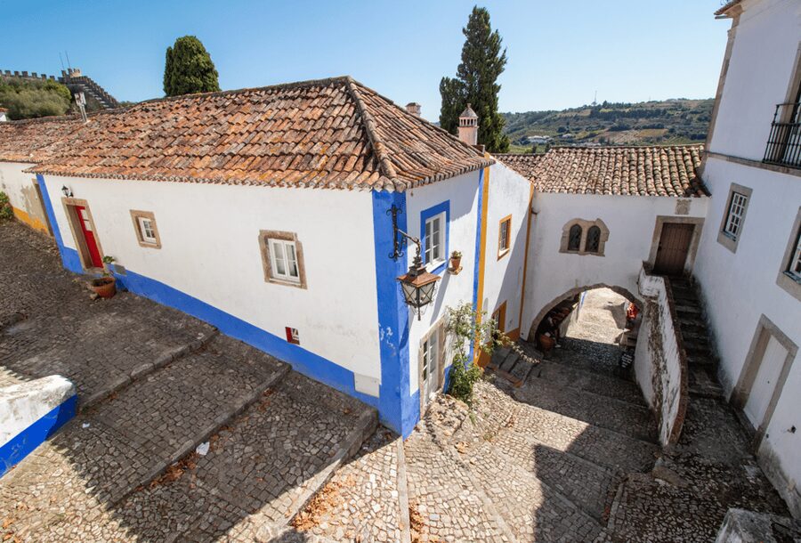 From Lisbon: Tour to Óbidos and Nazaré - Medieval Village, Ginja, and Giant Waves - Small group comfort and the value of two destinations in one day