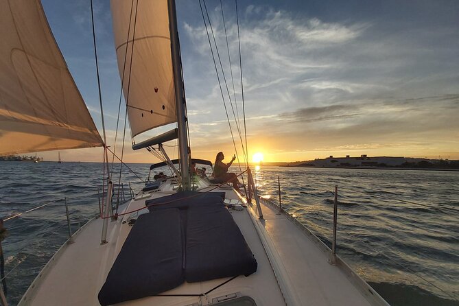 Golden Hour Boat Tour - Sailing by the Monuments with Wine - Golden hour on the Tagus: Lisbon at a slower speed