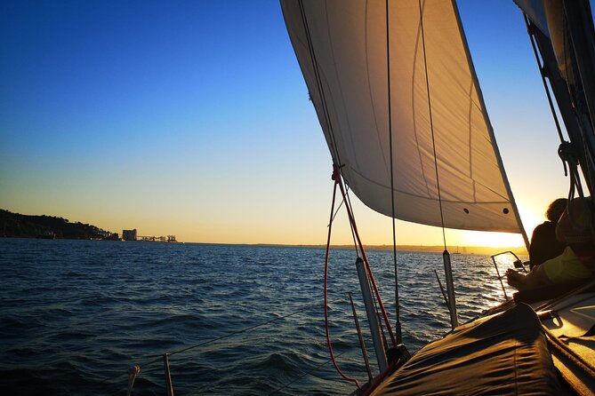 Golden Hour Boat Tour - Sailing by the Monuments with Wine - Commerce Square and the Augusta Arch: the riverfront rebuilt after 1755