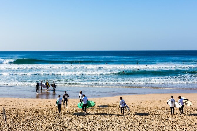 Group Surf Lesson in Costa da Caparica - On the Sand First: Warm-Up and Beach Instruction That Builds Real Confidence