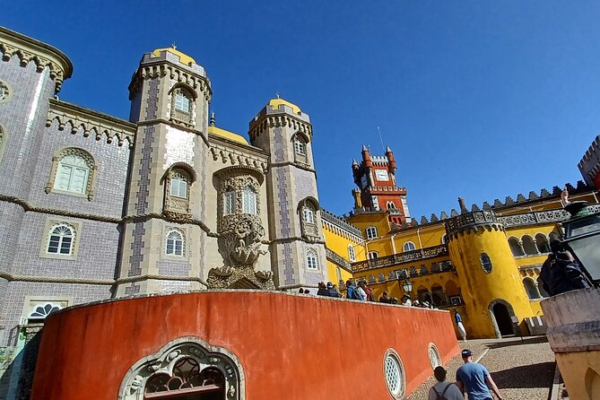 Group to Pena Palace, Sintra (pass by Regaleira) and Cascais - The Bond-movie connection near the beach and surf area
