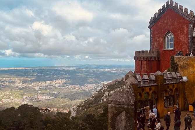 Half-Day Sintra Pena and Regaleira palace with Small Group - Quinta da Regaleira: gardens, grottoes, and the Initiation Well