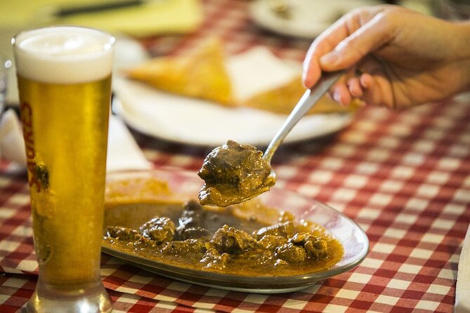 Hidden Flavors of the Hillside: Mouraria & Graça - Praca Martim Moniz: Train-Station History Where the Neighborhood Flows