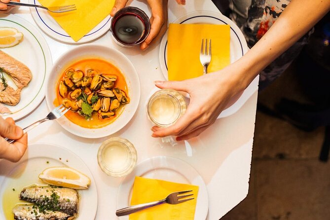 History and Flavors Experience Tour in Lisbon - Wine sips, walking pace, and why timing can feel different