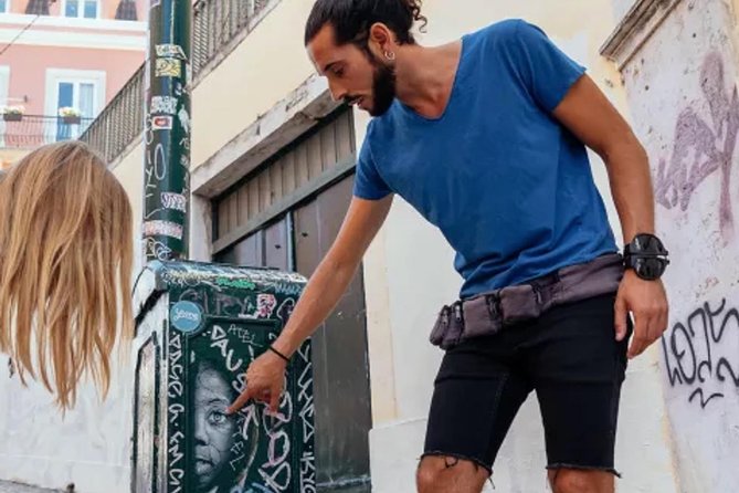 Kickstart Street Art Tour in Lisbon - Shepard Fairey x Vhils: the early stop that sets the tone