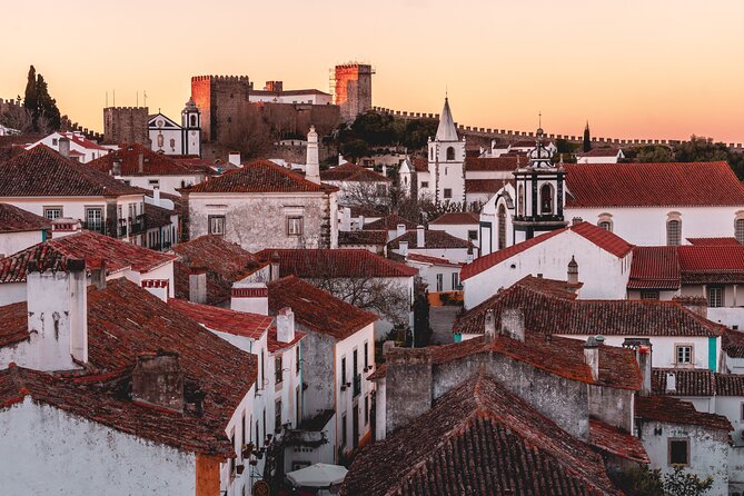 Knights Templar Castle, Nazaré & Óbidos️ Private Day Tour - Óbidos Walled Town: Castle Shadows, Medieval Streets, and Cherry Liqueur