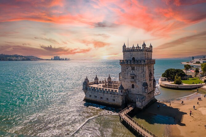 Lisbon 360 City Tour: Bike tour, Boat Trip and Helicopter Flight - Cycling to Belém and the Tagus Boat Ride: 25 de Abril Bridge from the Water